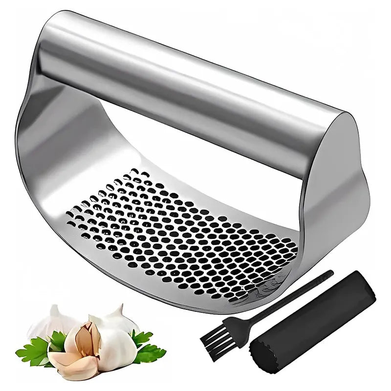 Stainless steel garlic press with a garlic bulb and brush on a white background