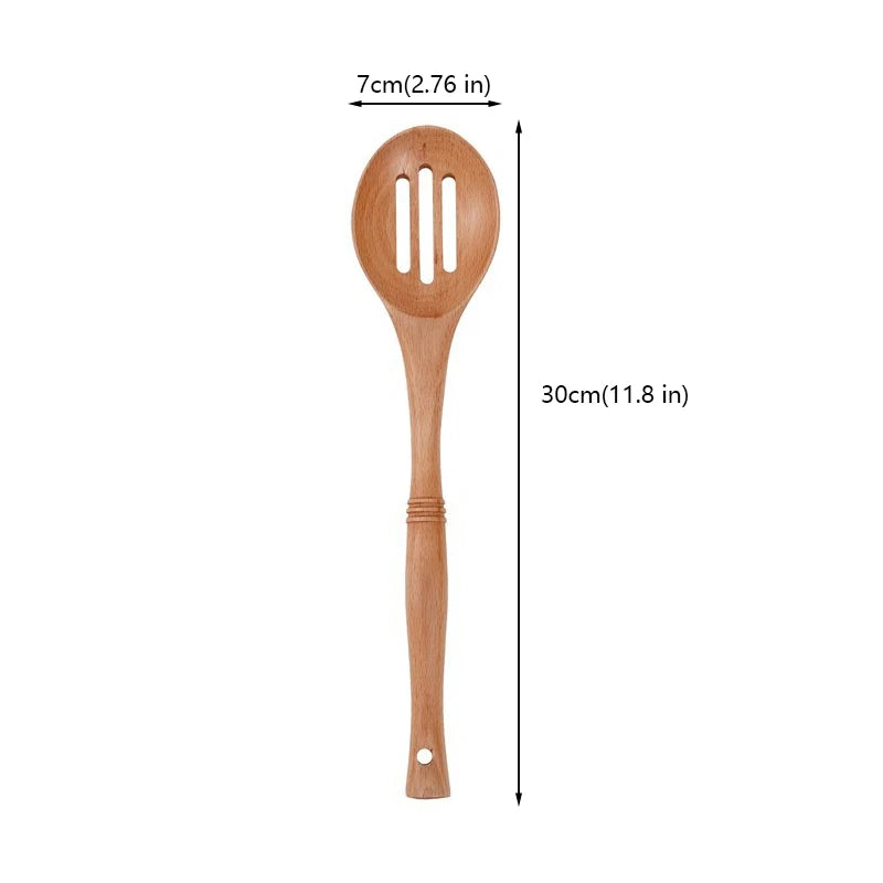Natural wood kitchen utensils set including spatula and spoon for eco-friendly, non-stick cooking.