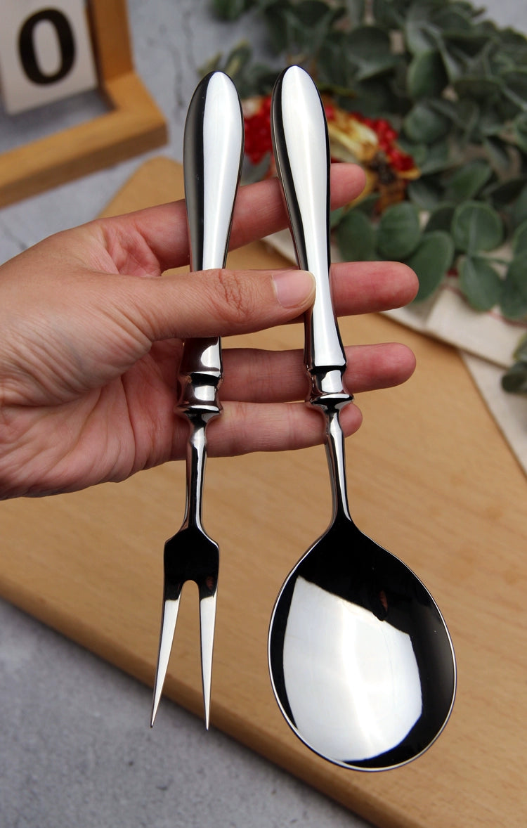 Stainless steel public meal sharing spoon and large meat fork set for BBQ, outdoor dining, and communal meals, with solid bar handle design.