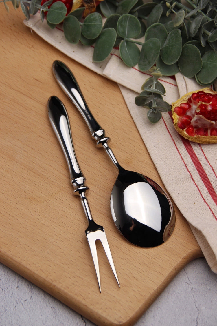 Stainless steel public meal sharing spoon and large meat fork set for BBQ, outdoor dining, and communal meals, with solid bar handle design.