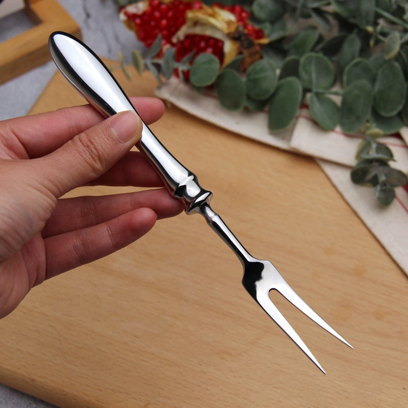 Stainless steel public meal sharing spoon and large meat fork set for BBQ, outdoor dining, and communal meals, with solid bar handle design.